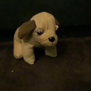 A brown puppy plush